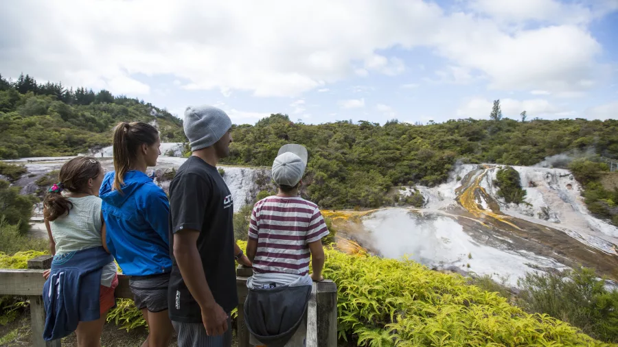 Family admiring the geothermal terraces from a lookout at Orakei Korako