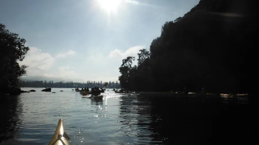 View from a kayak heading toward Taupō CBD in the soft evening light
