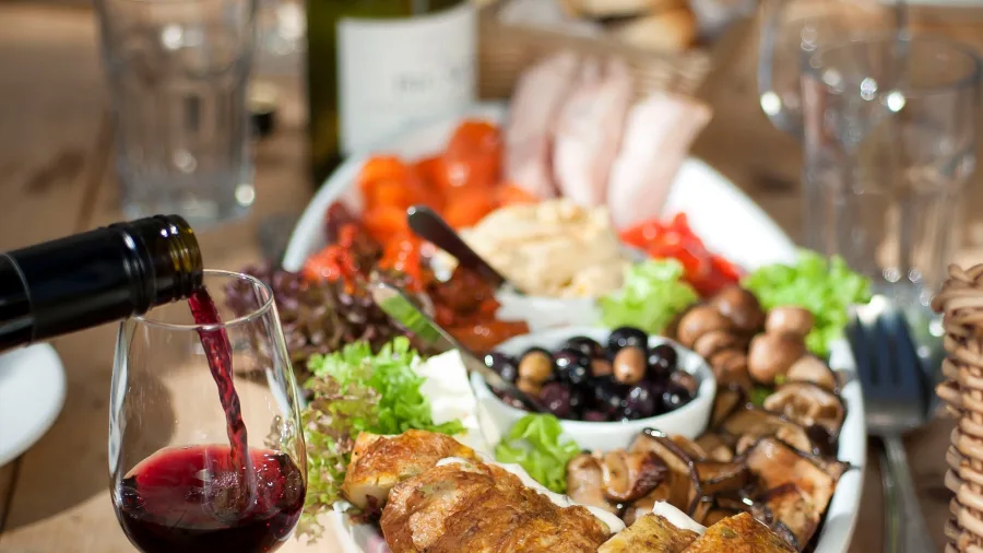 Close-up of gourmet food and wine platter in Martinborough