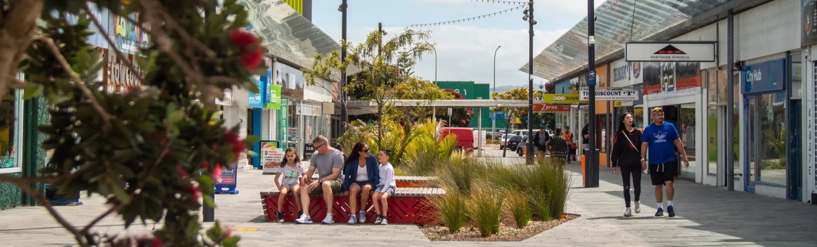 Shoppers strolling through Cobham Court in Porirua
