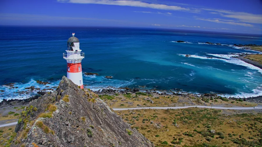 Cape Palliser Lighthouse overlooking the coastline in Palliser Bay Wellington Regio