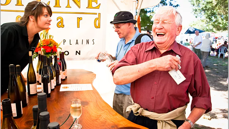 Man laughing while enjoying a wine tasting at Wairarapa Wines Harvest Festival