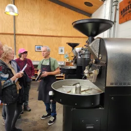 Coffee roaster giving a tour at Ripe Coffee Roasters in Petone