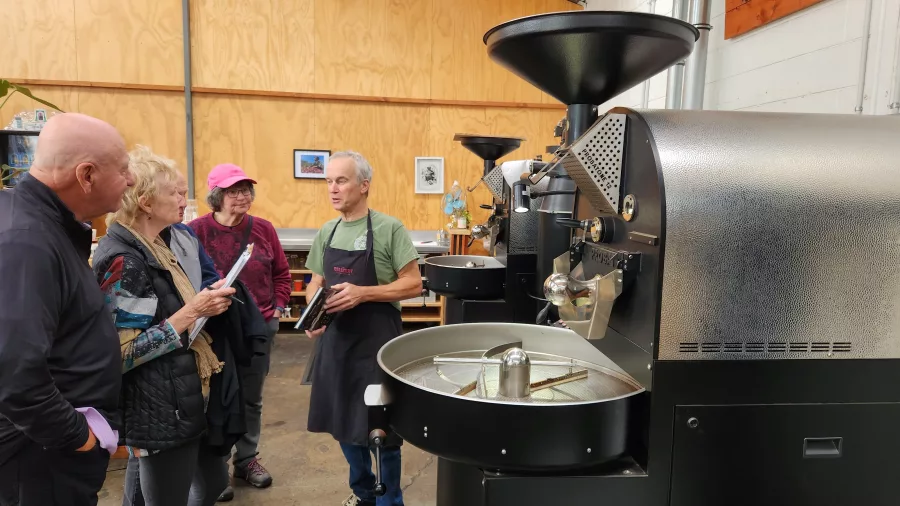 Coffee roaster giving a tour at Ripe Coffee Roasters in Petone
