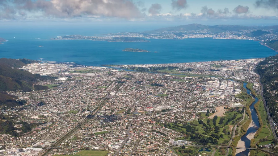 Aerial view of Wellington city and harbour with southern coast in the distance