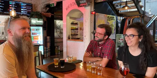 Group enjoying a craft beer tasting session at Fortune Favours in Wellington