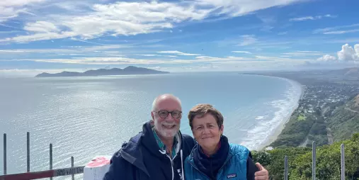 Couple at Paekākāriki Hill Lookout with panoramic views of Kāpiti Coast and Kāpiti Island