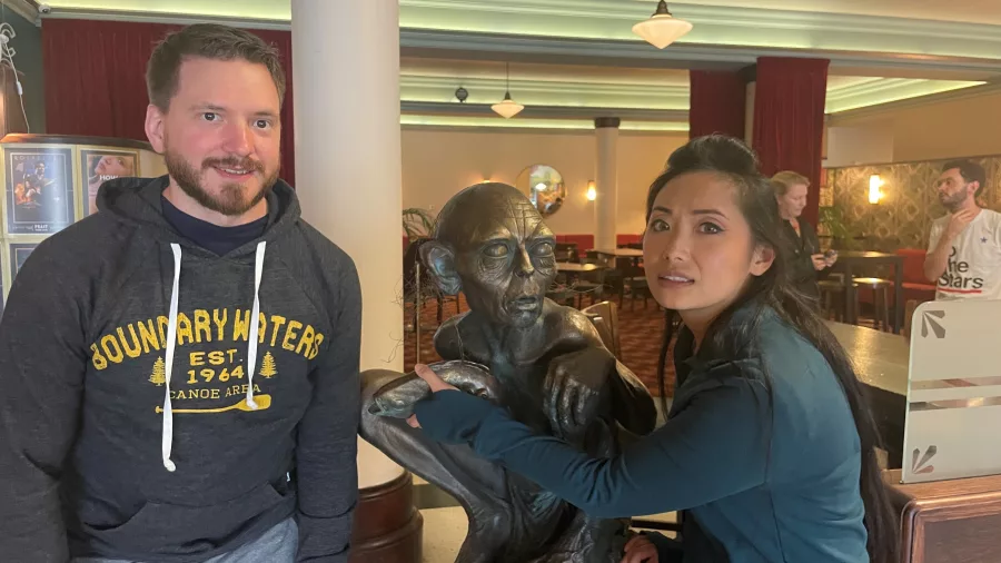 Visitors pose with the Gollum statue inside the Roxy Theatre in Miramar, Wellington, New Zealand