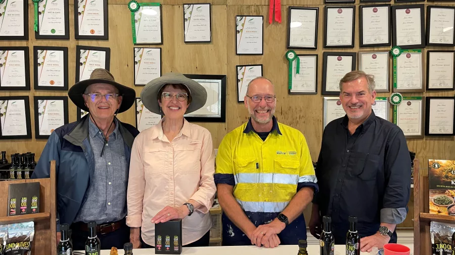 Group photo at Juno Olives with guests and staff after an olive oil tasting