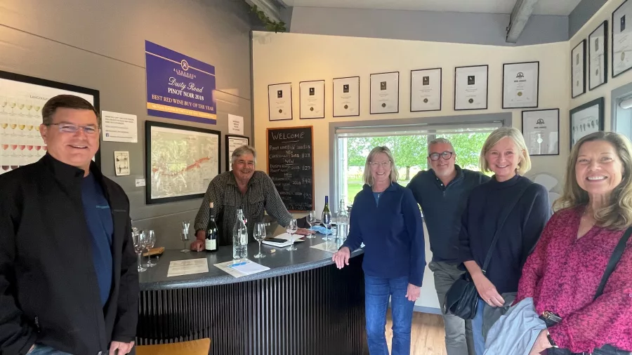Smiling group at a boutique wine tasting room in Martinborough