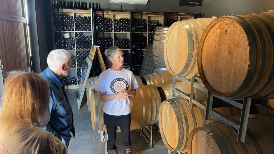 Wine barrel room tour at Poppies Martinborough
