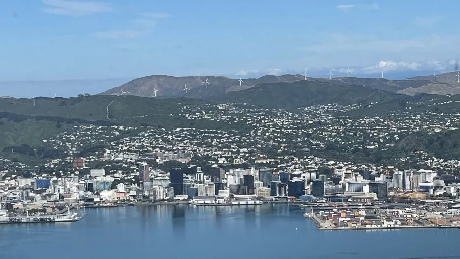 Aerial view of Wellington City with harbour and skyline framed by surrounding hills