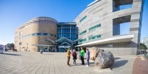 International visitors arriving at Te Papa Museum, Wellington, New Zealand's national museum