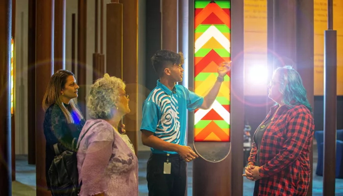 Te Papa tour guide explaining Māori design during Introducing Te Papa tour