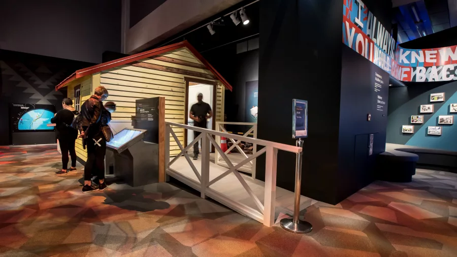 Visitors interacting with Te Taiao exhibit at Te Papa museum in Wellington