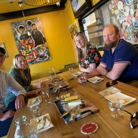 Guests enjoying a cheese tasting experience during the Martinborough Foodie Tour