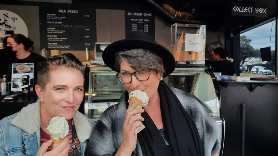 Two women enjoying Zany Zeus ice cream in Petone during a foodie tour