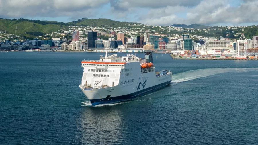 Interislander ferry departing Wellington Harbour with cityscape in the background