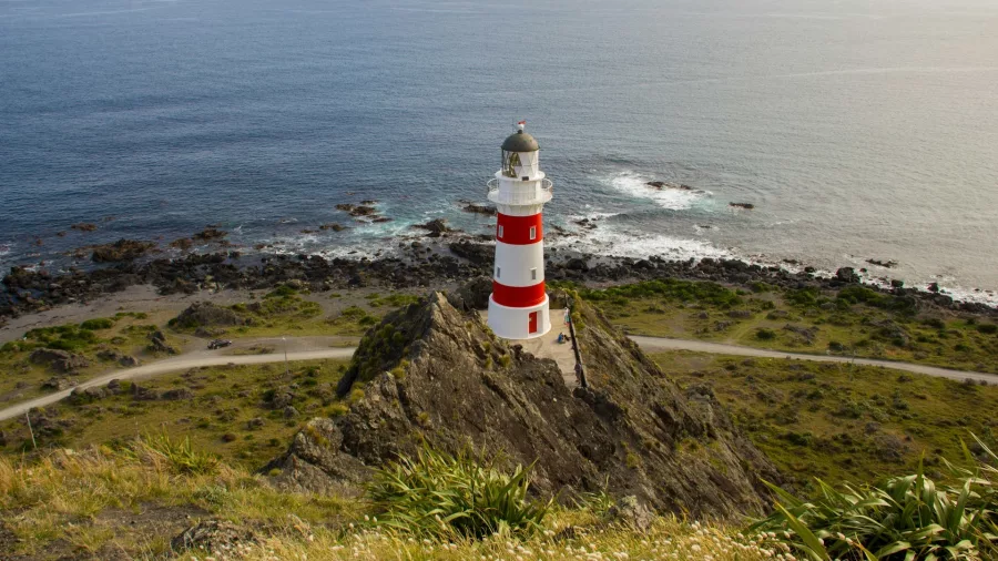 Aerial view of Cape Palliser Lighthouse on the Wairarapa coast overlooking the rocky shoreline