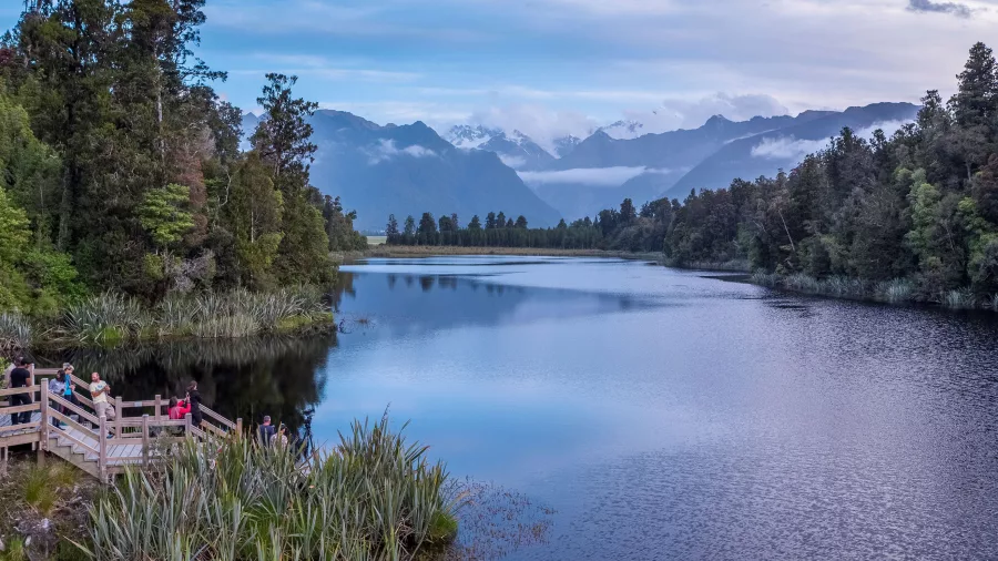 Reflection Island at Lake Matheson near Fox Glacier with Southern Alps reflected on the water