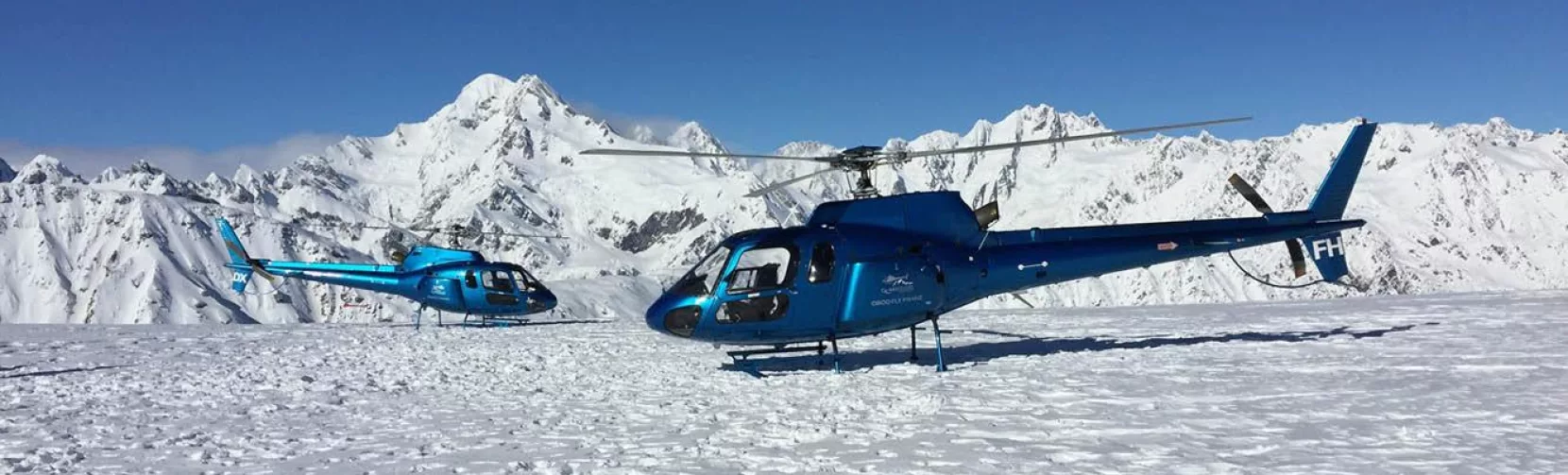Glacier Country Helicopters’ Squirrel helicopters on a snow landing above Franz Josef Glacier in the Southern Alps
