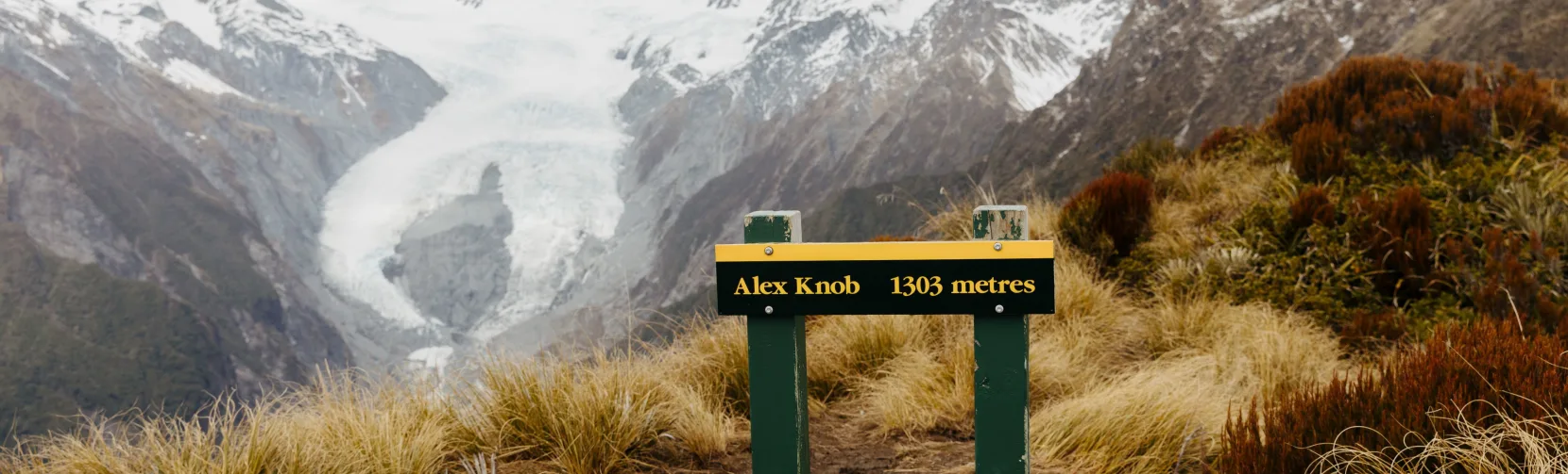 Alex Knob Track sign overlooking Franz Josef Glacier on the West Coast of New Zealand