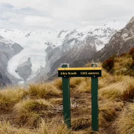 Alex Knob Track sign overlooking Franz Josef Glacier on the West Coast of New Zealand