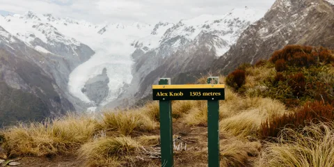 Alex Knob Track sign overlooking Franz Josef Glacier on the West Coast of New Zealand