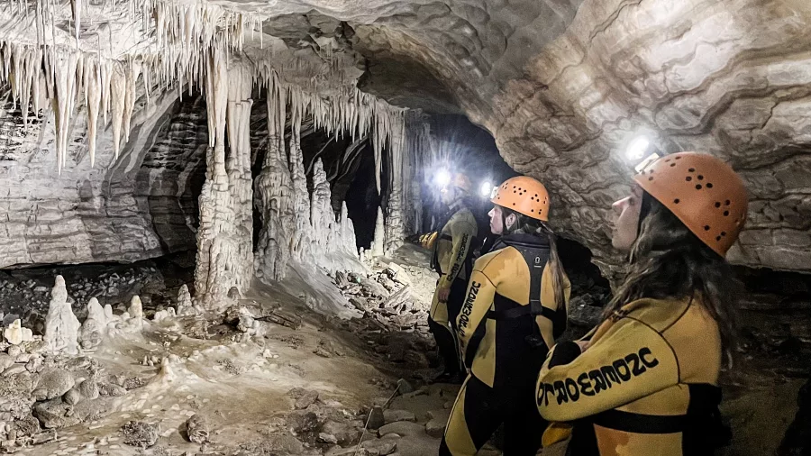 Explorers in limestone cave with Underworld Adventures on the West Coast of New Zealand