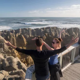 Visitors at the Pancake Rocks and Blowhole lookout in Punakaiki on the West Coast